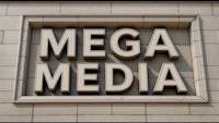 a sign that says mega media on the side of a building